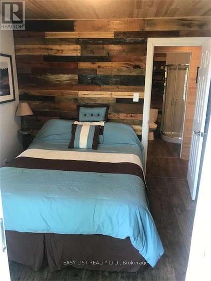 61 Maple Drive, Perry, ON - Indoor Photo Showing Bedroom