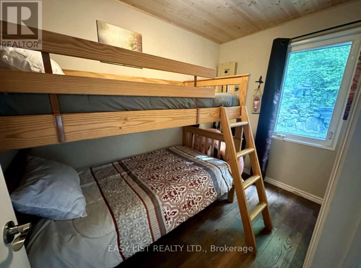 61 Maple Drive, Perry, ON - Indoor Photo Showing Bedroom