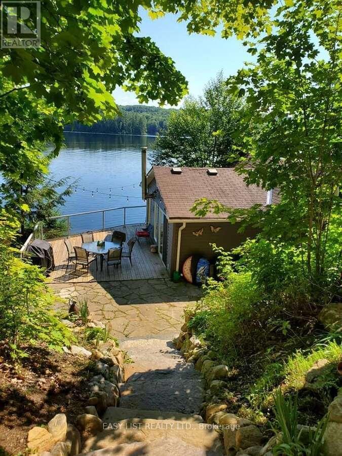 61 Maple Drive, Perry, ON - Outdoor With Body Of Water