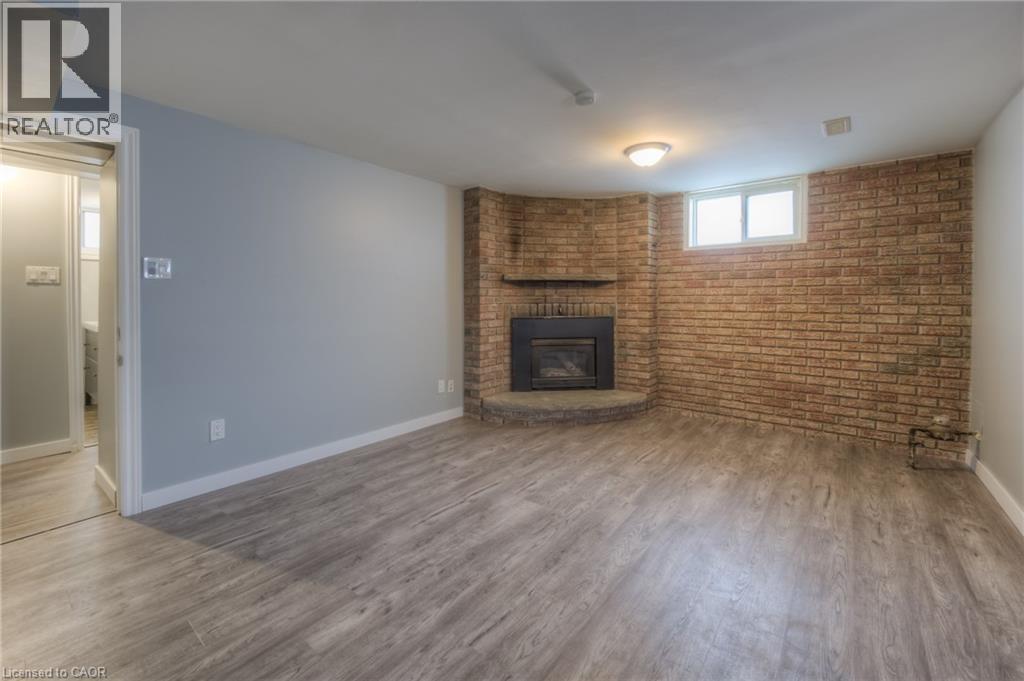 74 Helene Crescent, Waterloo, ON - Indoor Photo Showing Living Room With Fireplace