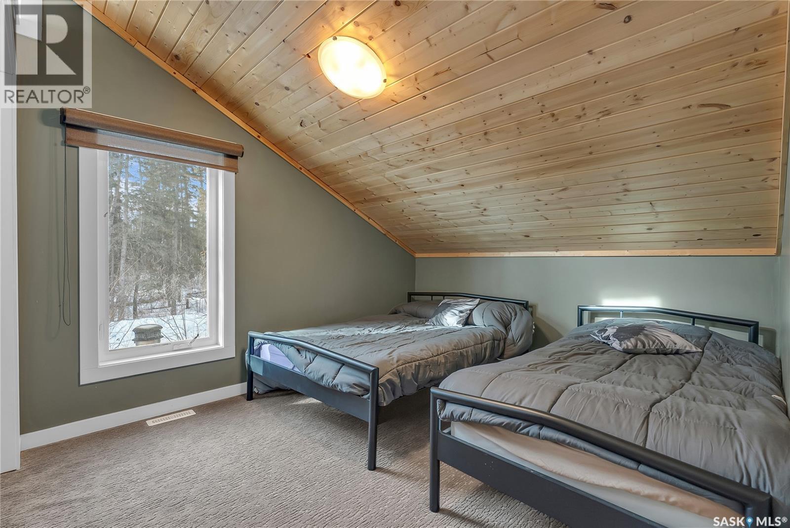 102 Moore Drive, Christopher Lake, SK - Indoor Photo Showing Bedroom