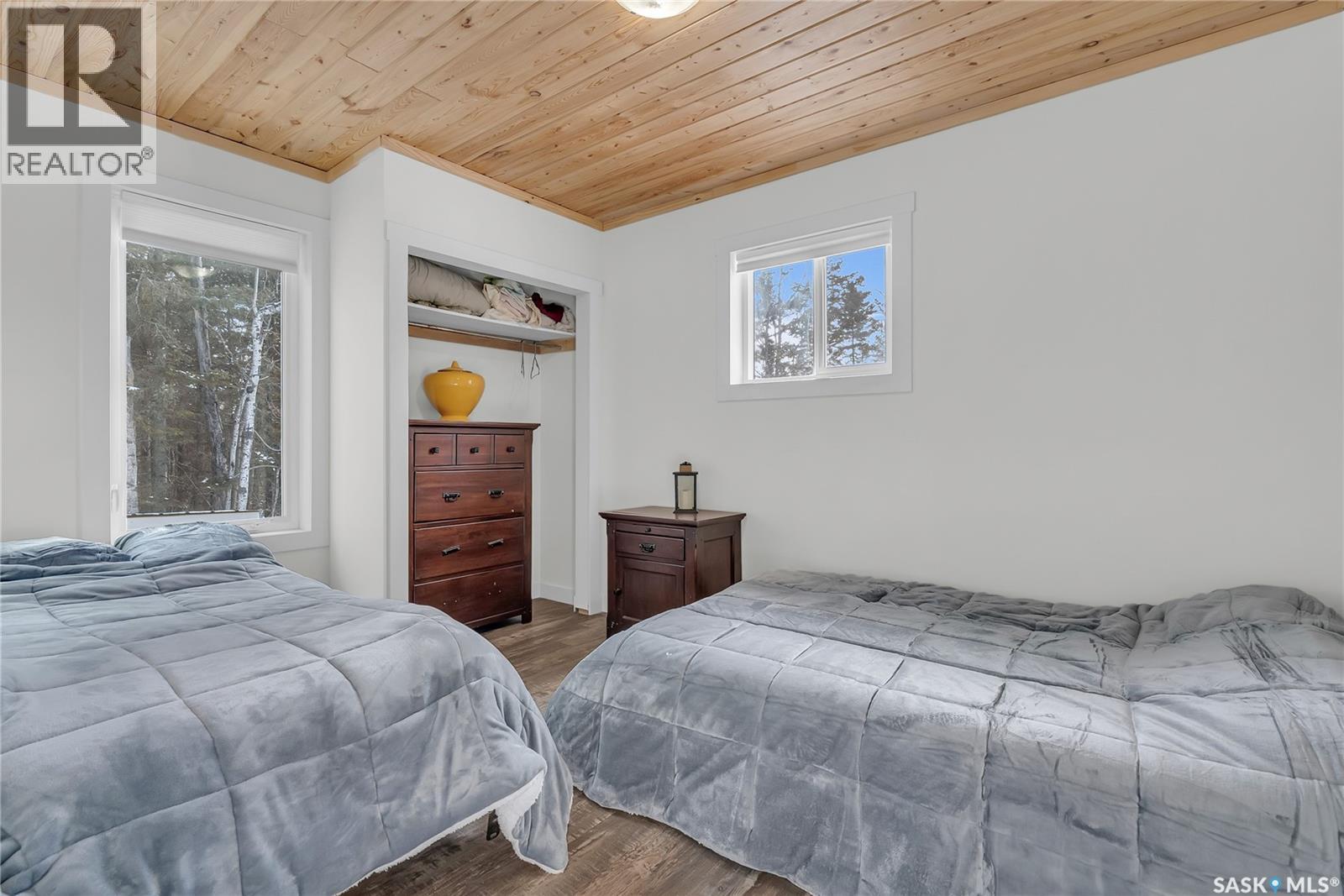 102 Moore Drive, Christopher Lake, SK - Indoor Photo Showing Bedroom