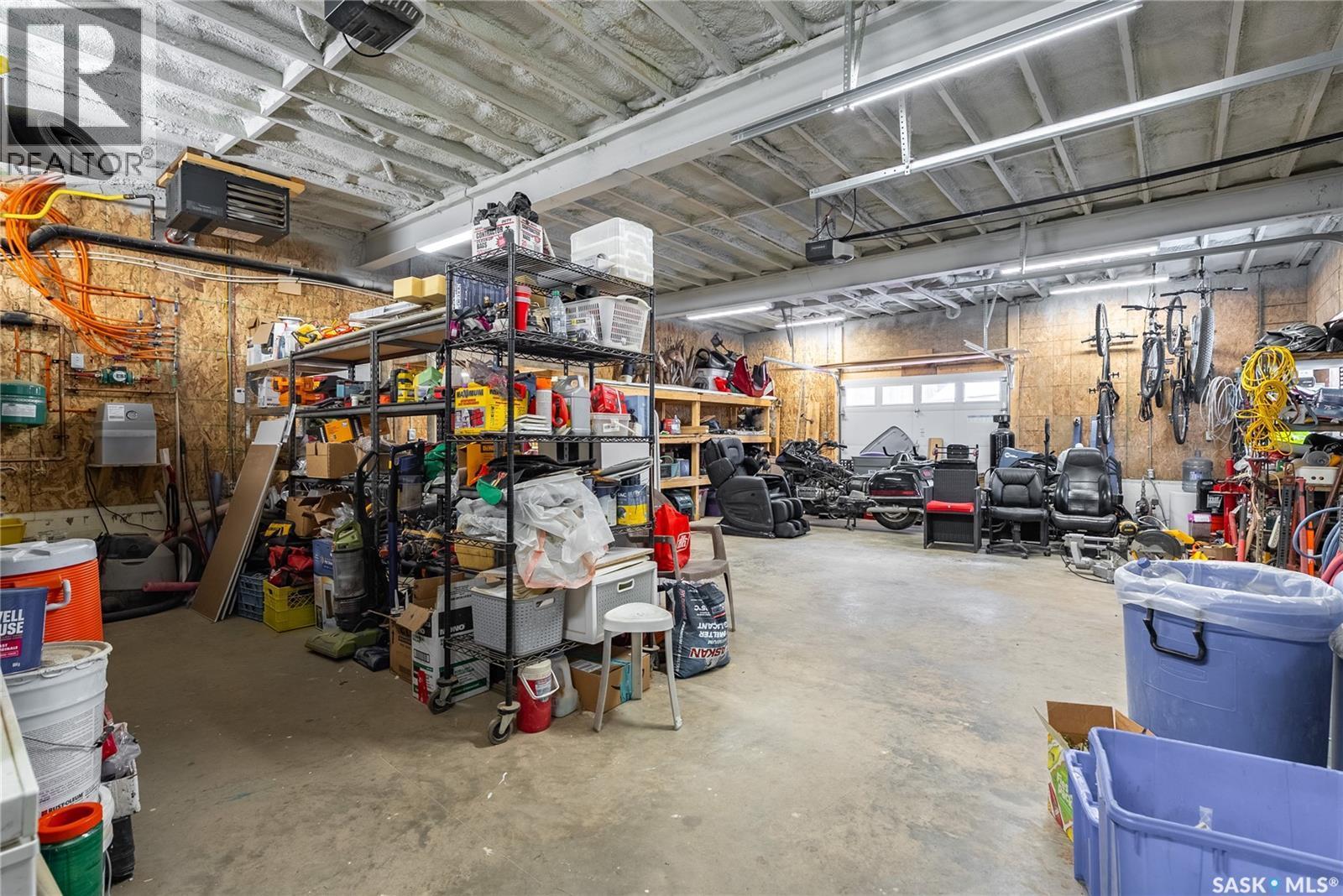 102 Moore Drive, Christopher Lake, SK - Indoor Photo Showing Garage