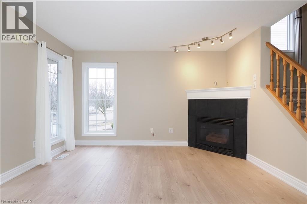 695 Jacob Lane, Waterloo, ON - Indoor With Fireplace