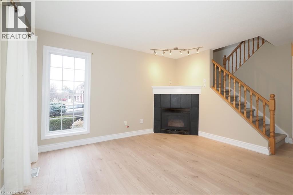 695 Jacob Lane, Waterloo, ON - Indoor With Fireplace