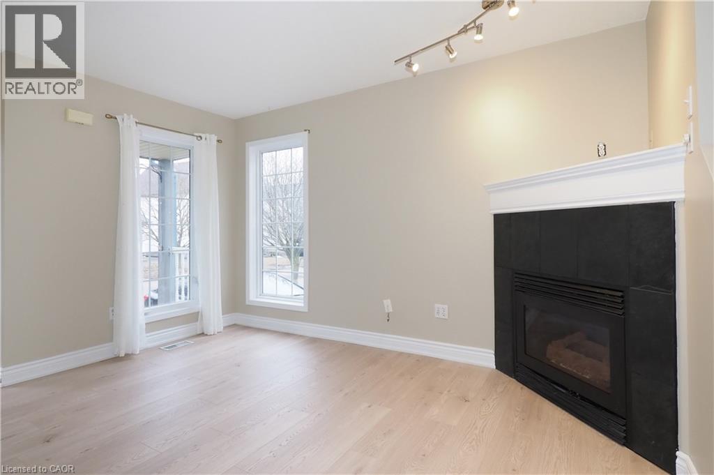 695 Jacob Lane, Waterloo, ON - Indoor Photo Showing Living Room With Fireplace