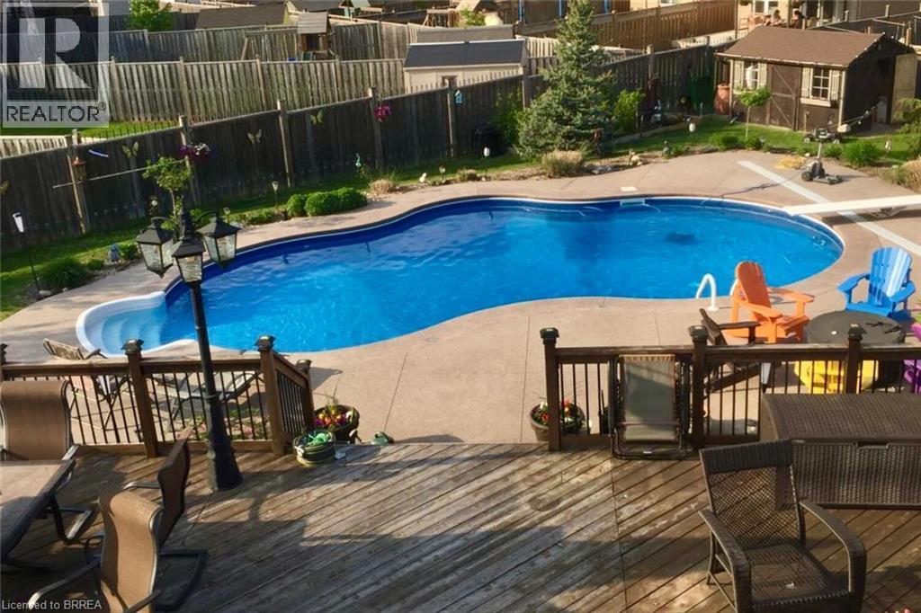 962 Pebblecreek Court, Kitchener, ON - Outdoor With In Ground Pool With Deck Patio Veranda With Backyard