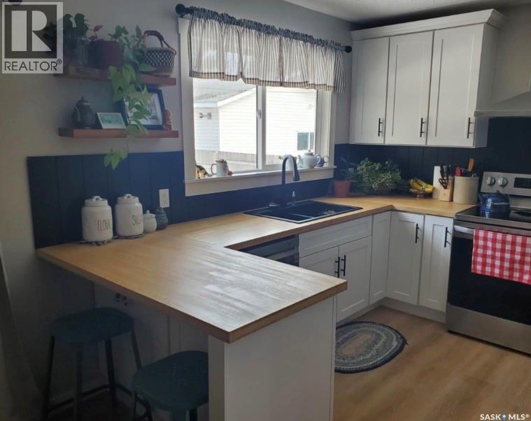 105 6Th Avenue S, Big River, SK - Indoor Photo Showing Kitchen With Double Sink