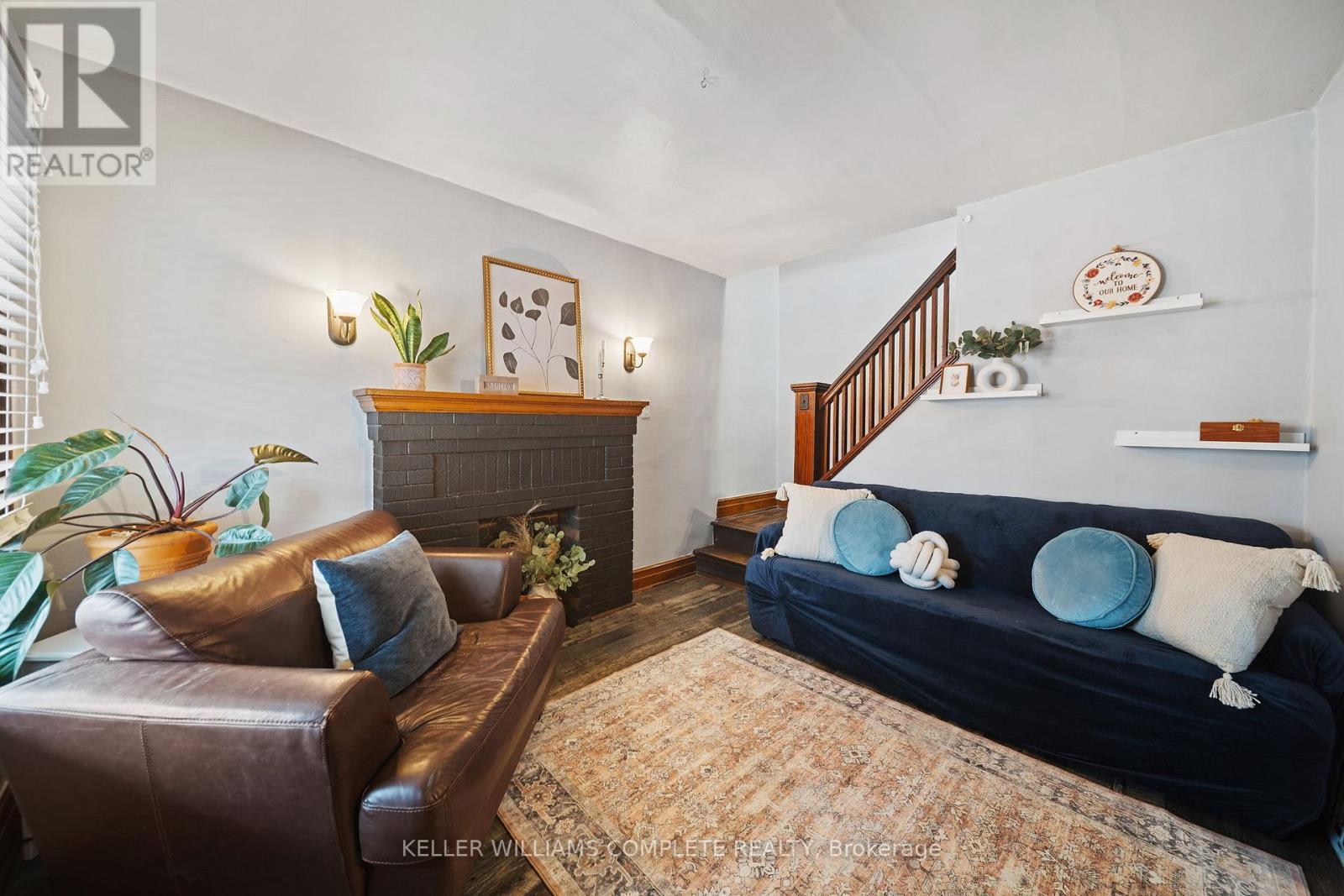 Living Room Space - 22 Cope Street, Hamilton, ON - Indoor With Fireplace