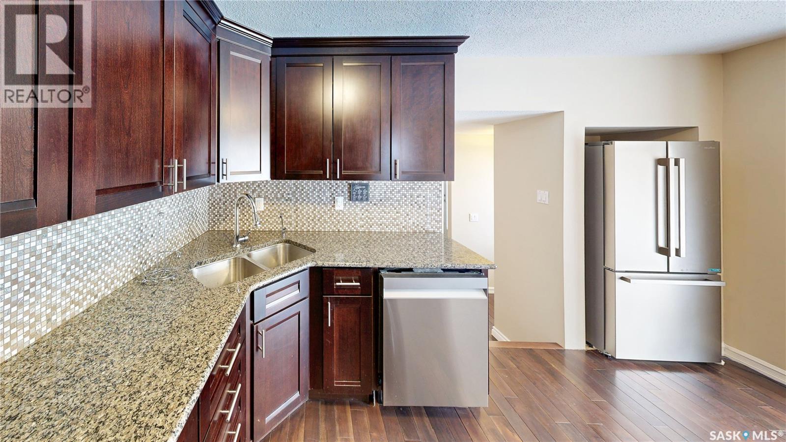 50 Lowry Place, Regina, SK - Indoor Photo Showing Kitchen With Double Sink