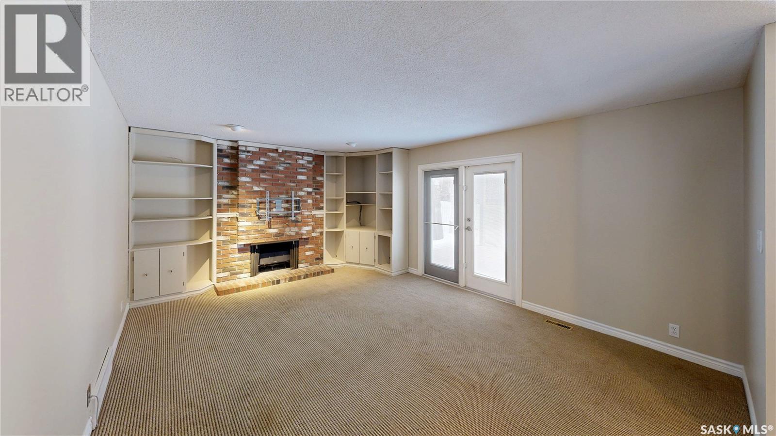 50 Lowry Place, Regina, SK - Indoor With Fireplace