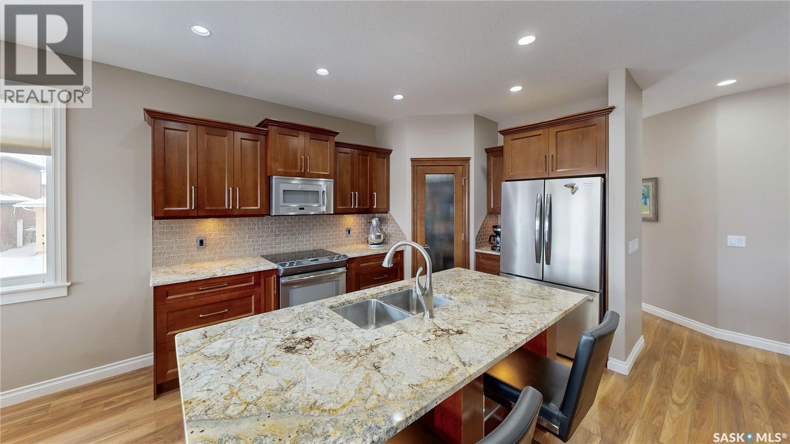 4342 Skinner Place, Regina, SK - Indoor Photo Showing Kitchen With Stainless Steel Kitchen With Double Sink With Upgraded Kitchen
