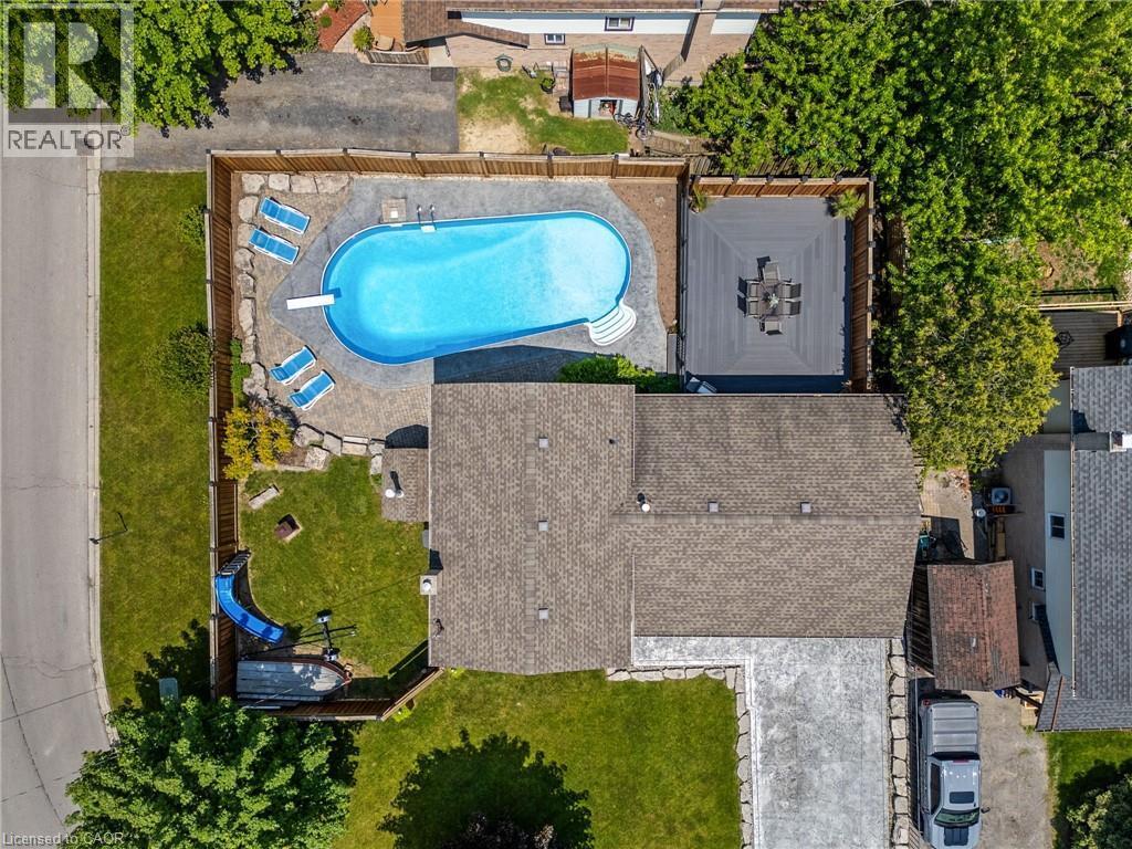25 Burke Drive, Caledonia, ON - Outdoor With In Ground Pool