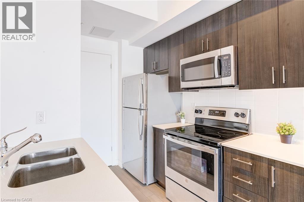 550 North Service Road Unit# 516, Grimsby, ON - Indoor Photo Showing Kitchen With Stainless Steel Kitchen With Double Sink