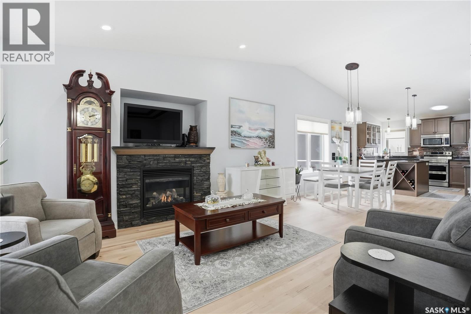 5053 Canuck Crescent, Regina, SK - Indoor Photo Showing Living Room With Fireplace