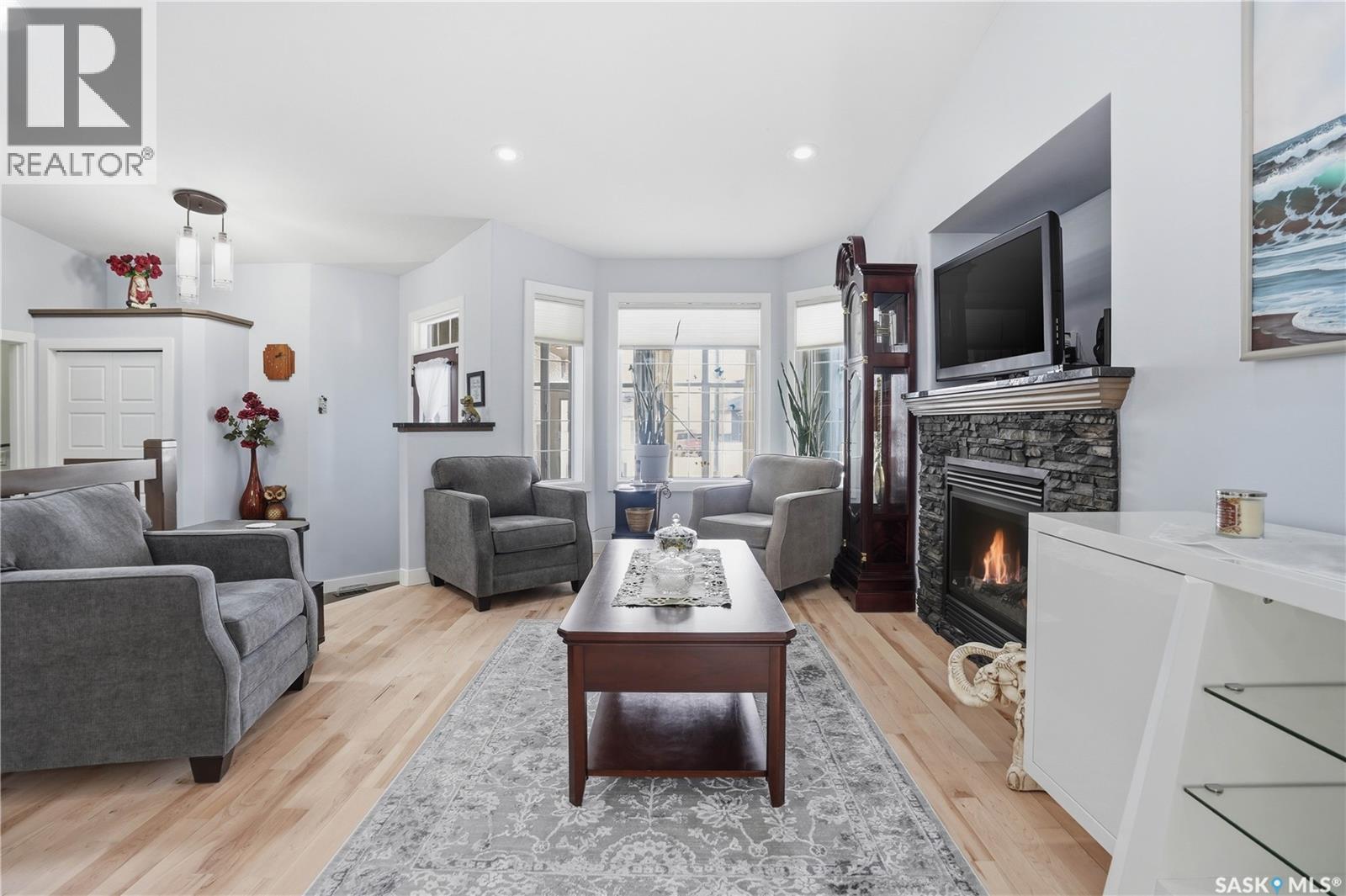 5053 Canuck Crescent, Regina, SK - Indoor Photo Showing Living Room With Fireplace