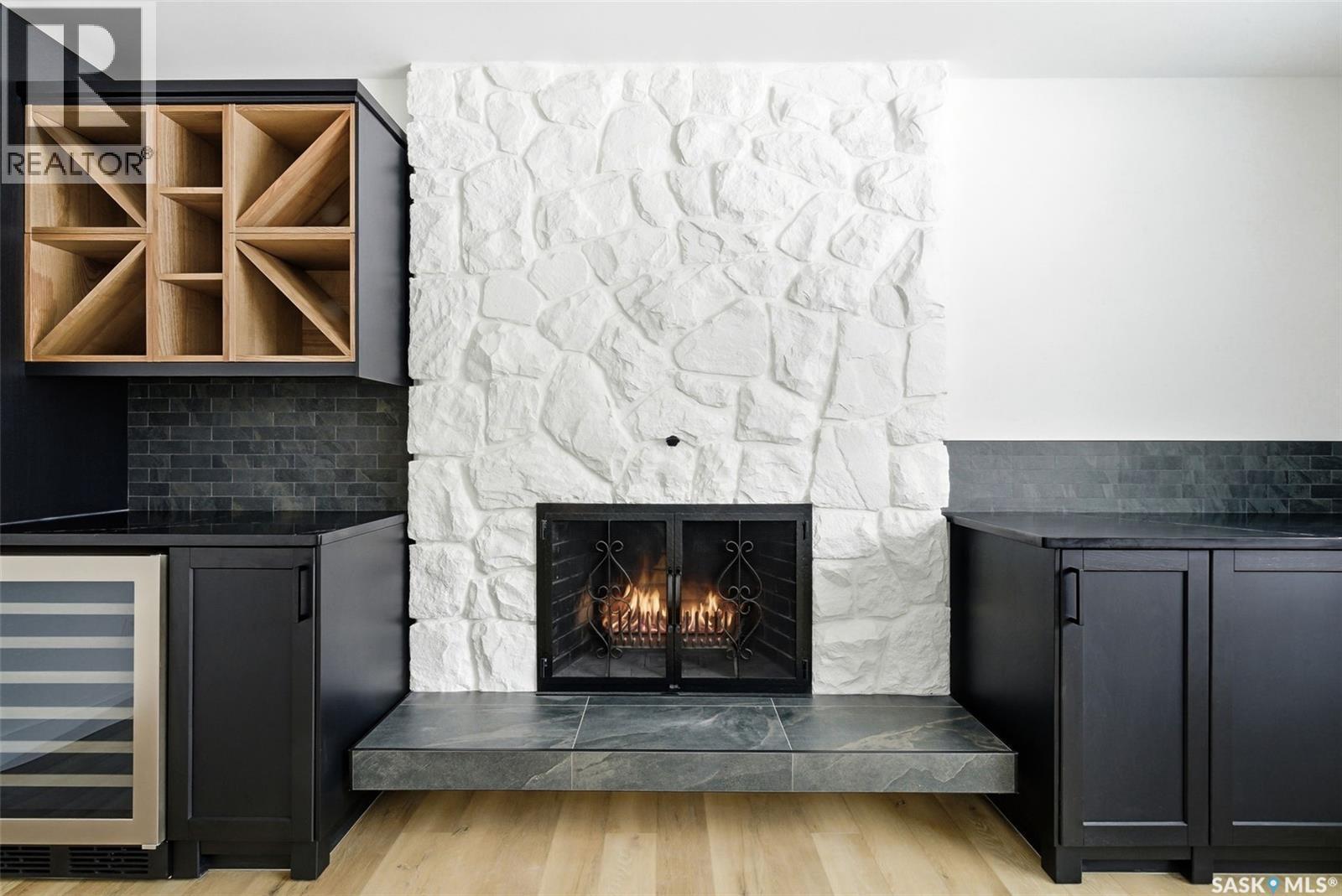 8 Thatcher Road, Regina, SK - Indoor With Fireplace