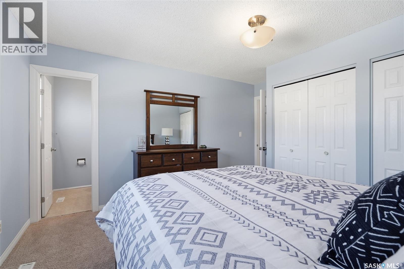 138 Quill Crescent, Saskatoon, SK - Indoor Photo Showing Bedroom