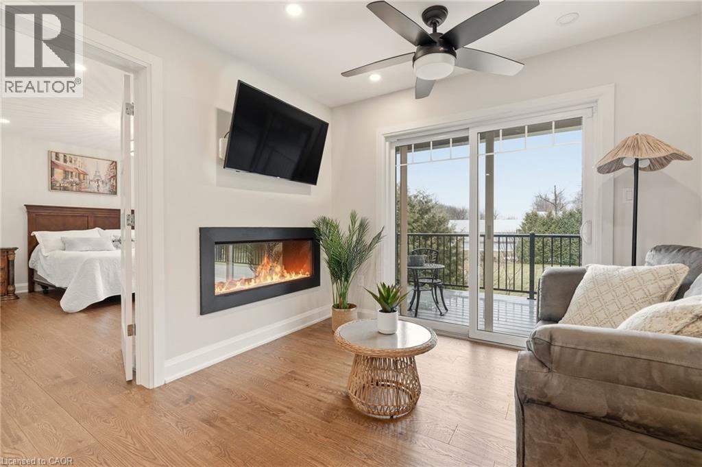 1354 1 Sideroad, Burlington, ON - Indoor Photo Showing Living Room With Fireplace