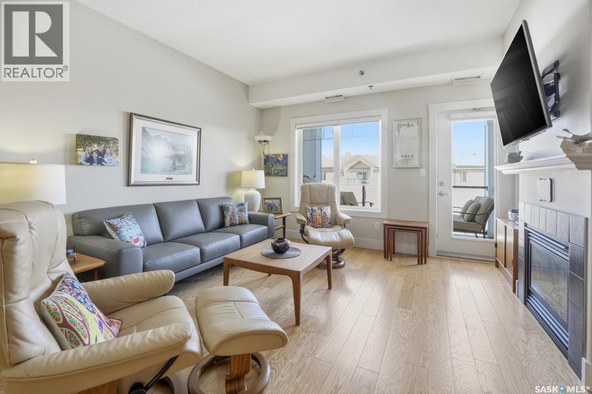 327 1010 Ruth Street E, Saskatoon, SK - Indoor Photo Showing Living Room With Fireplace