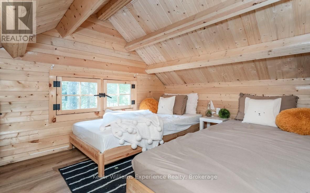 1 Sundown Road, Tiny, ON - Indoor Photo Showing Bedroom