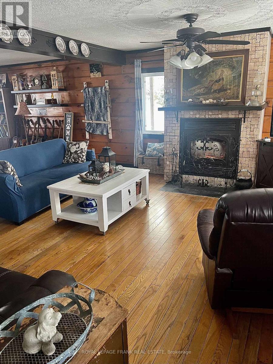 461 Lower Faraday Road, Faraday, ON - Indoor Photo Showing Living Room With Fireplace