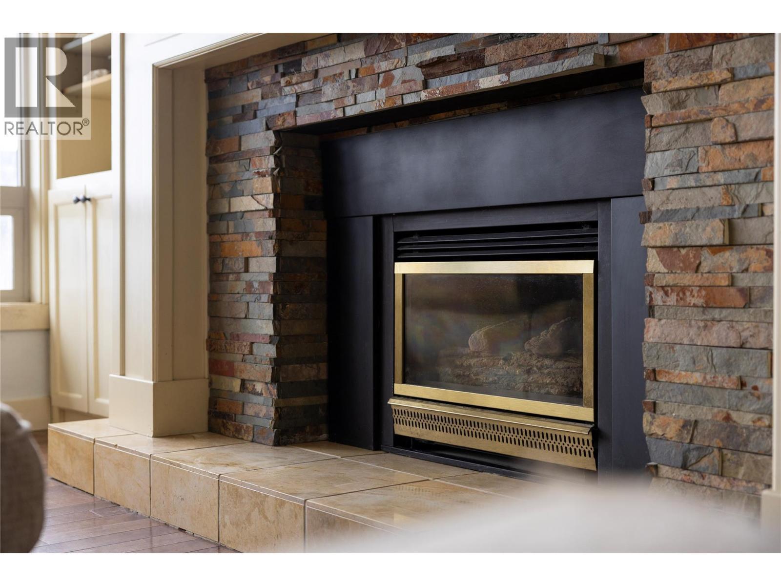 8705 Kalview Drive, Coldstream, BC - Indoor Photo Showing Other Room With Fireplace