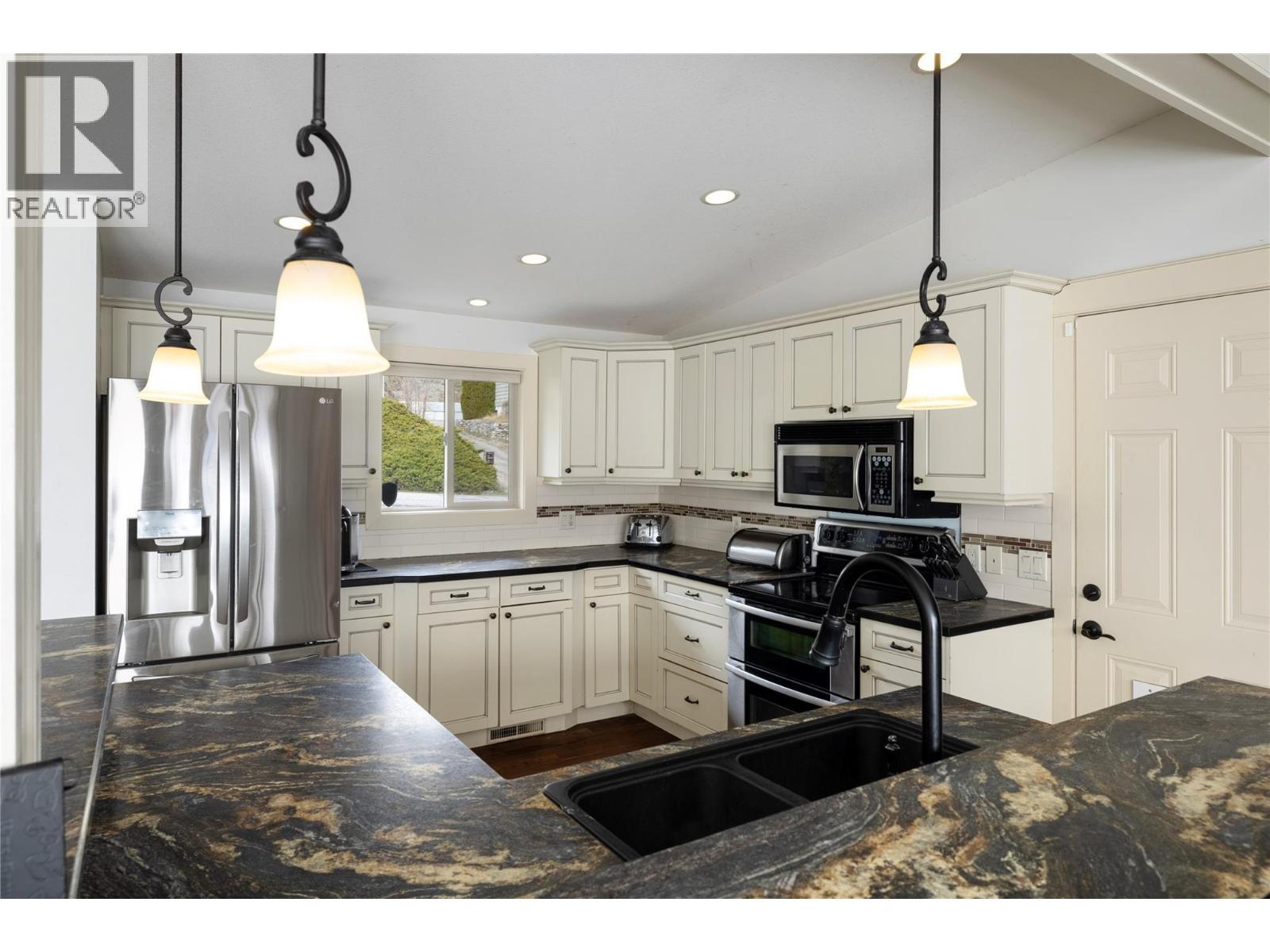 8705 Kalview Drive, Coldstream, BC - Indoor Photo Showing Kitchen With Double Sink