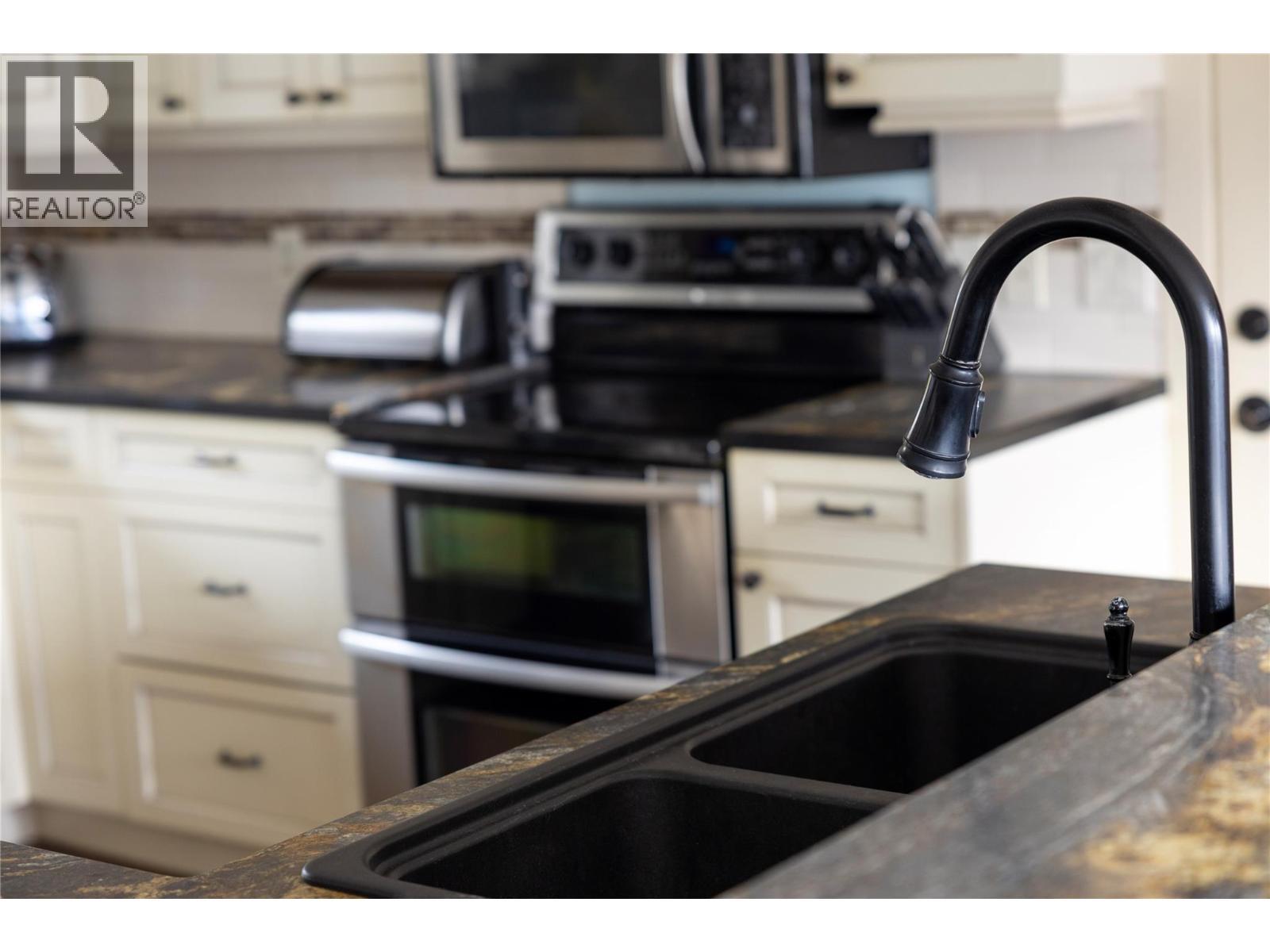 8705 Kalview Drive, Coldstream, BC - Indoor Photo Showing Kitchen With Double Sink