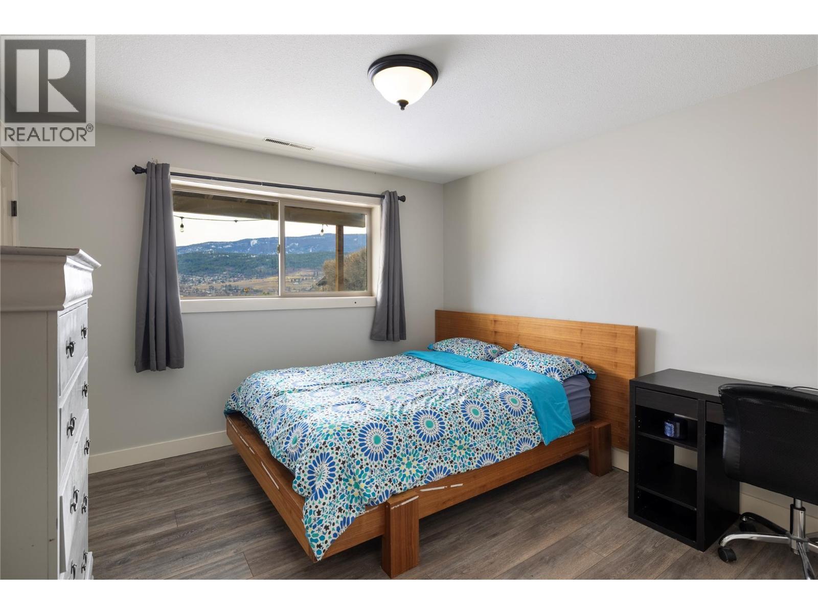 Bedroom 4 - 8705 Kalview Drive, Coldstream, BC - Indoor Photo Showing Bedroom