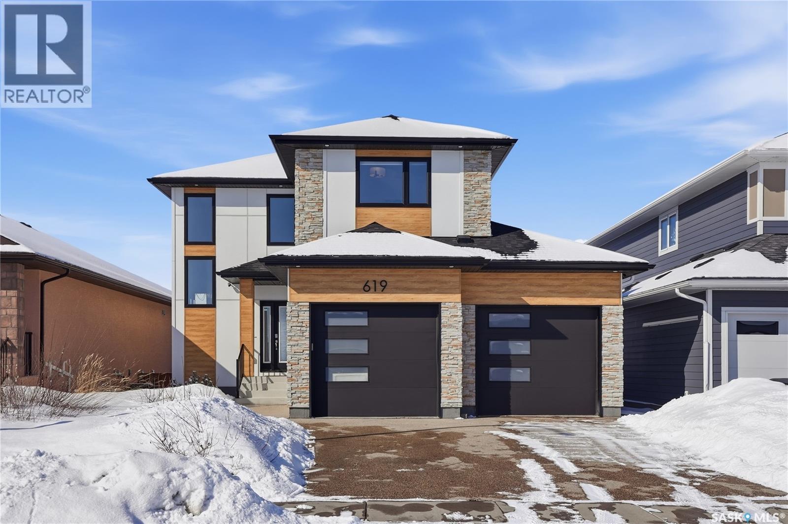 619 Fast Crescent, Saskatoon, SK - Outdoor With Facade