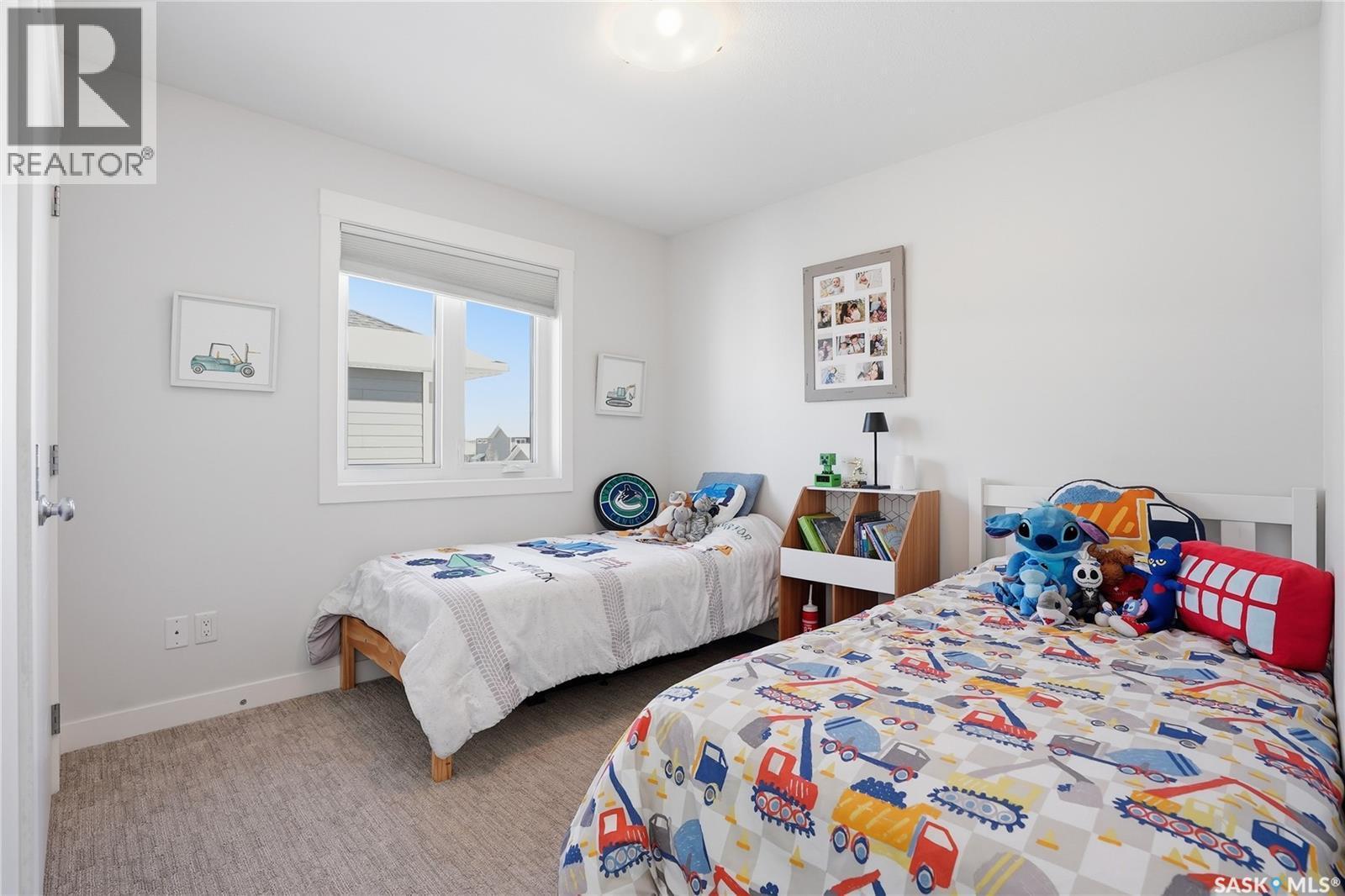 619 Fast Crescent, Saskatoon, SK - Indoor Photo Showing Bedroom