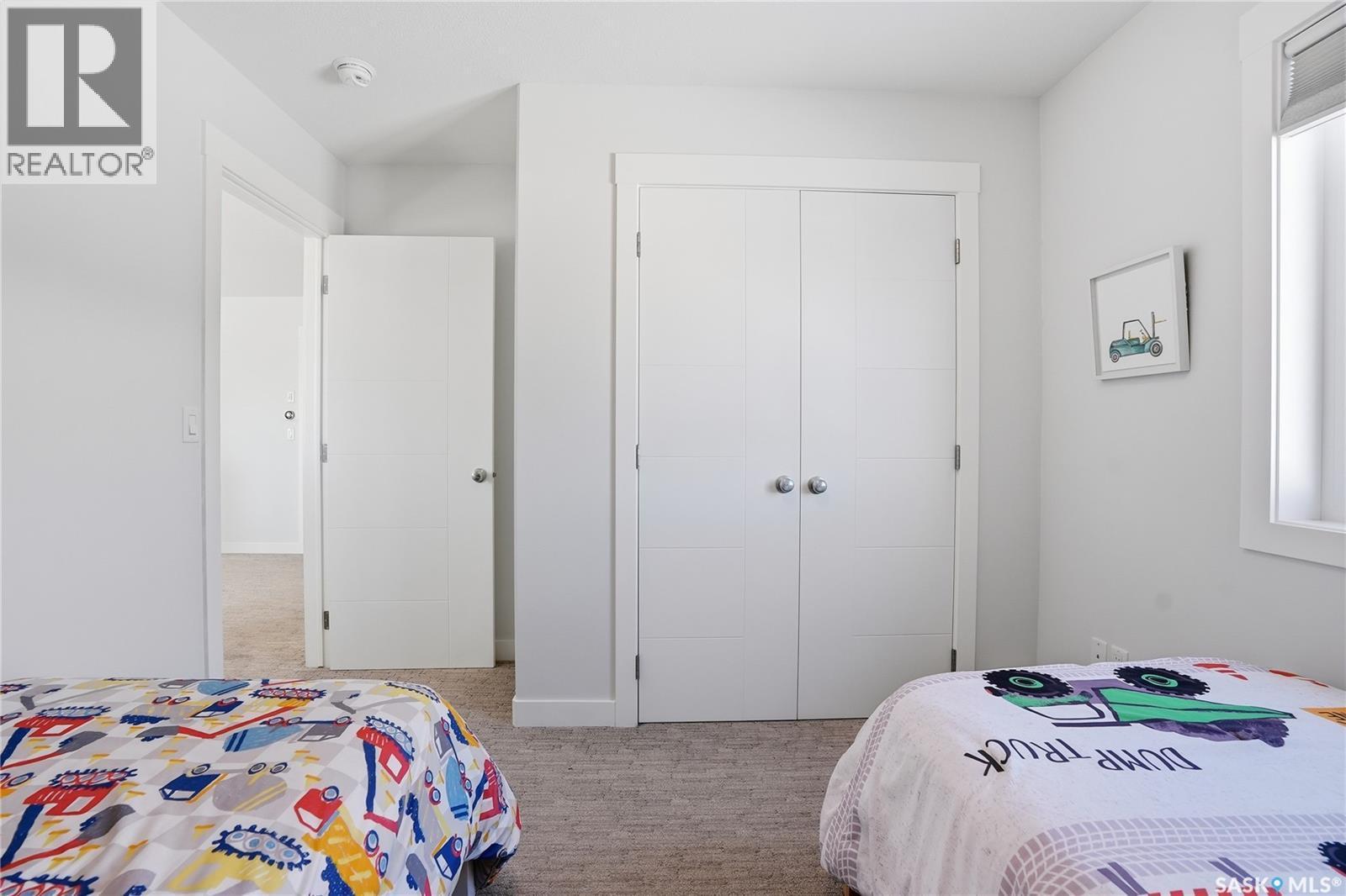 619 Fast Crescent, Saskatoon, SK - Indoor Photo Showing Bedroom