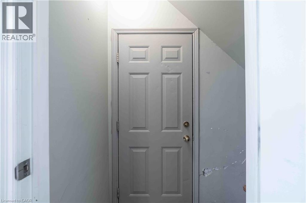 Entrance to the double car garage - 16 Clansman Crescent, Caledonia, ON - Indoor Photo Showing Other Room