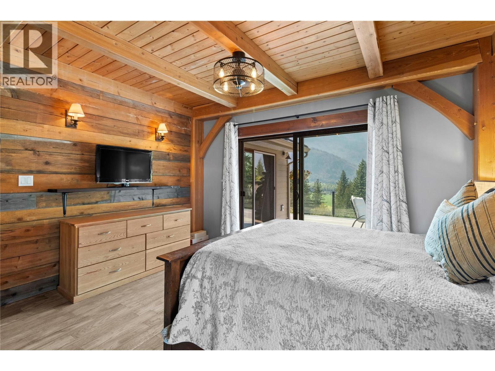 Primary Bedroom - reverse view - 1403 Notch Hill Road, Sorrento, BC - Indoor Photo Showing Bedroom