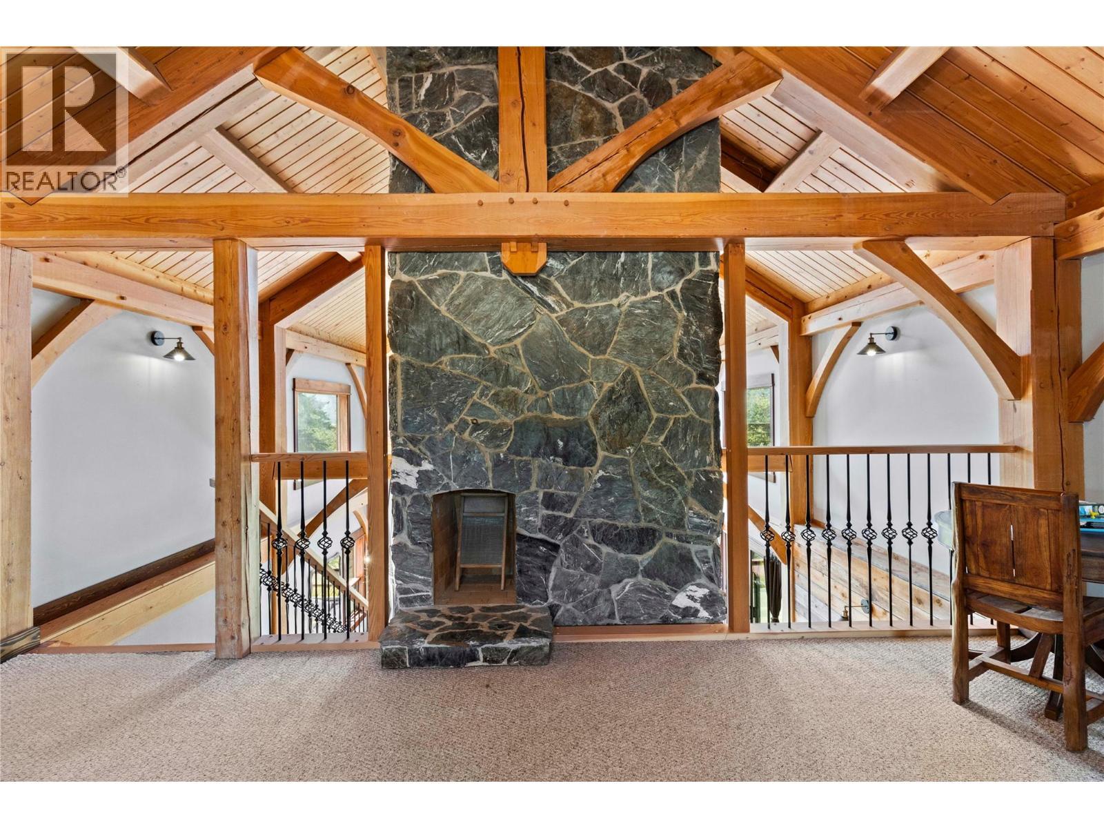 Upstairs Loft Family Room with fireplace - 1403 Notch Hill Road, Sorrento, BC - Photo Showing Other Room With Fireplace