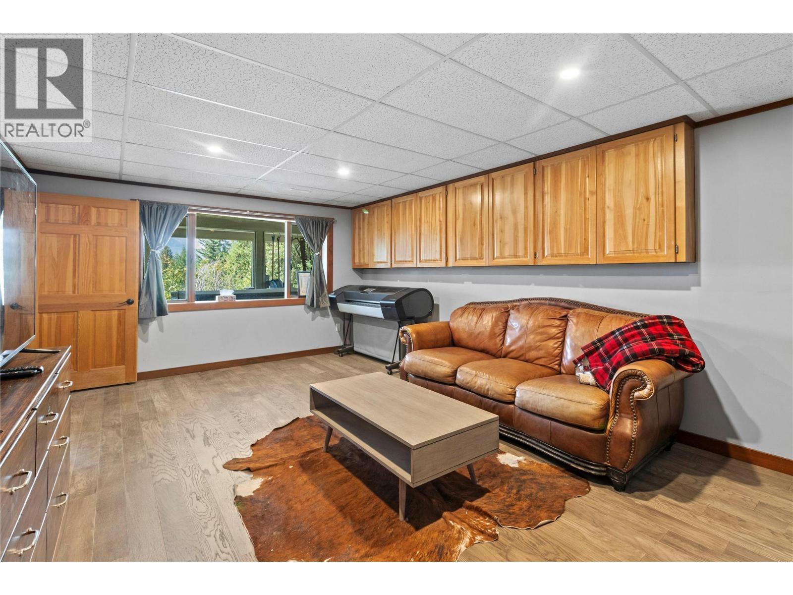 Lower level Recreation Room - reverse view - 1403 Notch Hill Road, Sorrento, BC - Indoor