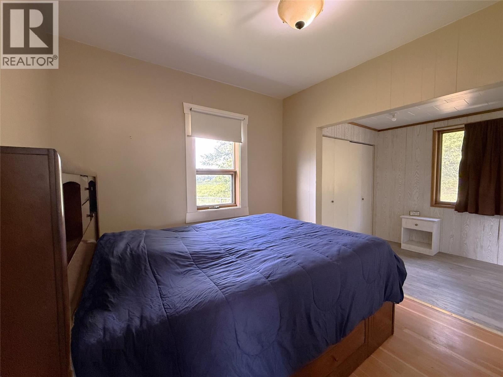 Main Floor Primary Bedroom - 1403 Notch Hill Road, Sorrento, BC - Indoor Photo Showing Bedroom
