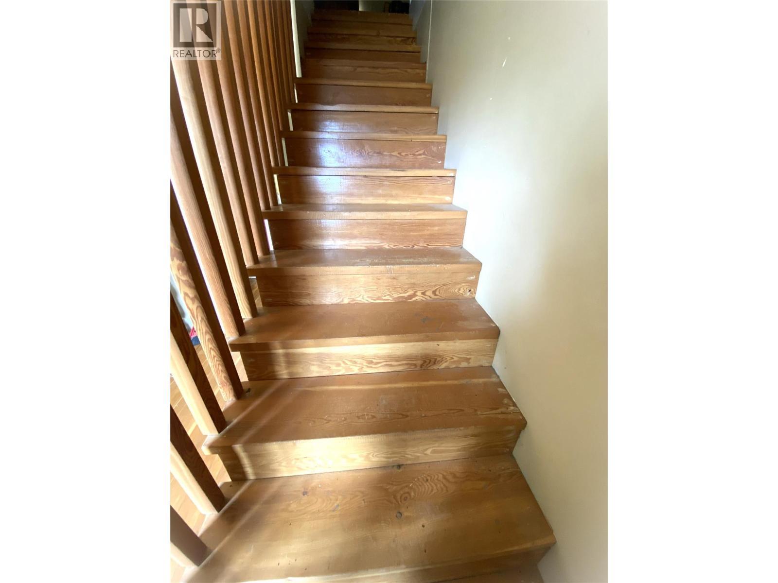 Stairs to 2nd storey - 1403 Notch Hill Road, Sorrento, BC - Indoor Photo Showing Other Room