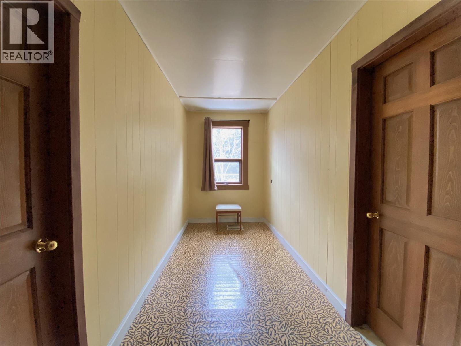 Upstairs Hall Room with Bedrooms off either side - 1403 Notch Hill Road, Sorrento, BC - Indoor Photo Showing Other Room