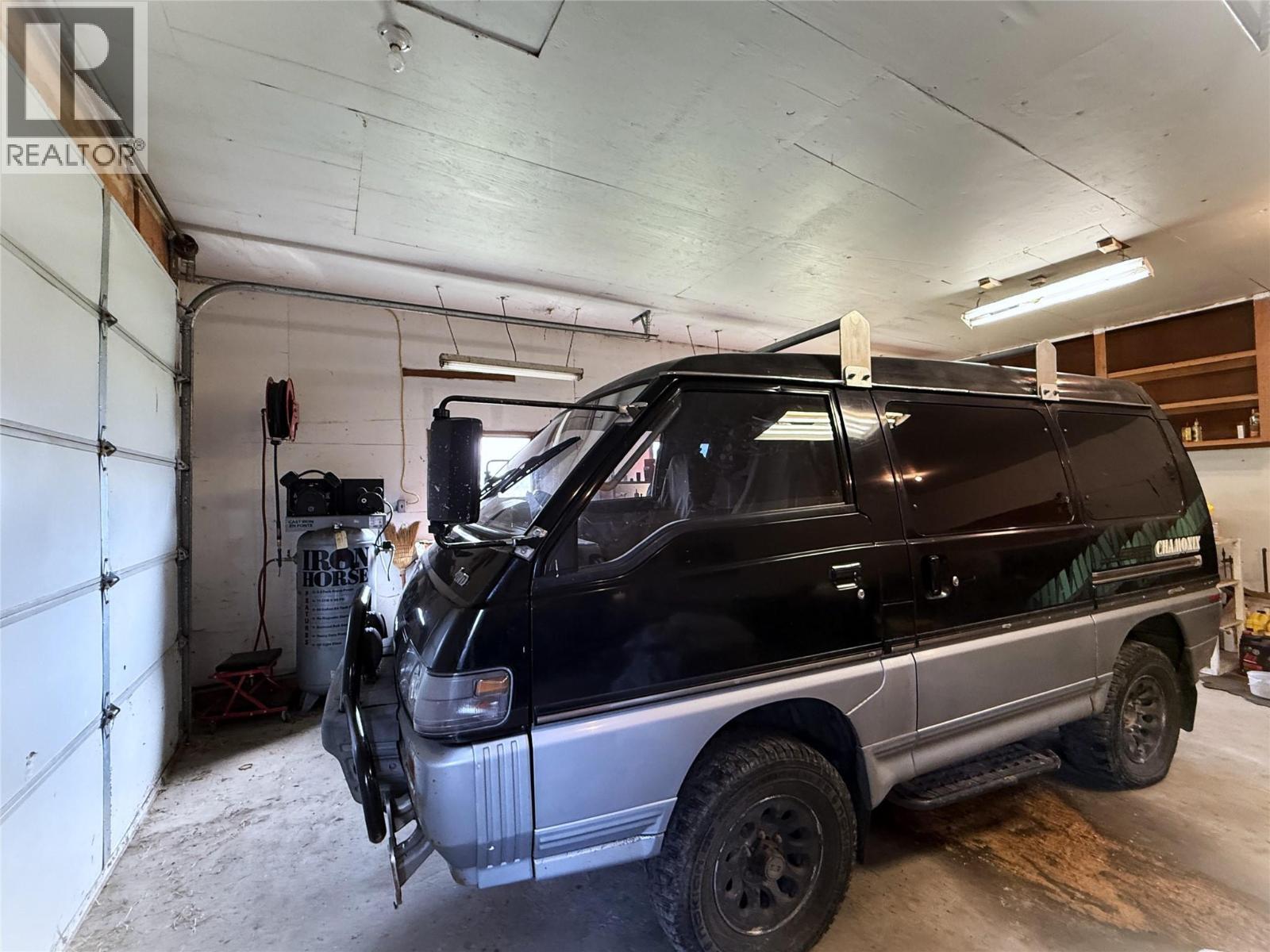 Garage interior - 1403 Notch Hill Road, Sorrento, BC - Indoor Photo Showing Garage