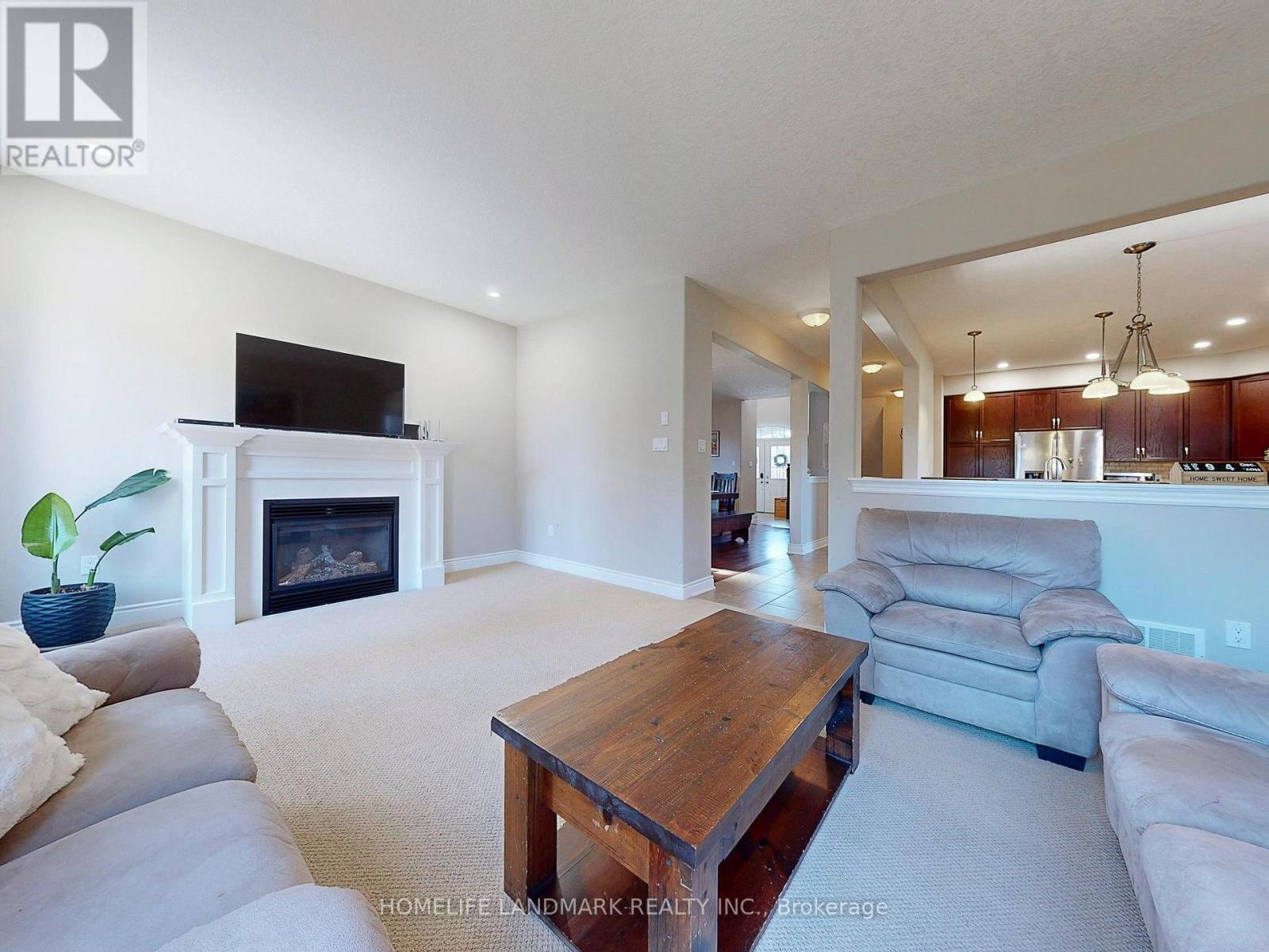73 Graihawk Drive, Barrie, ON - Indoor Photo Showing Living Room With Fireplace