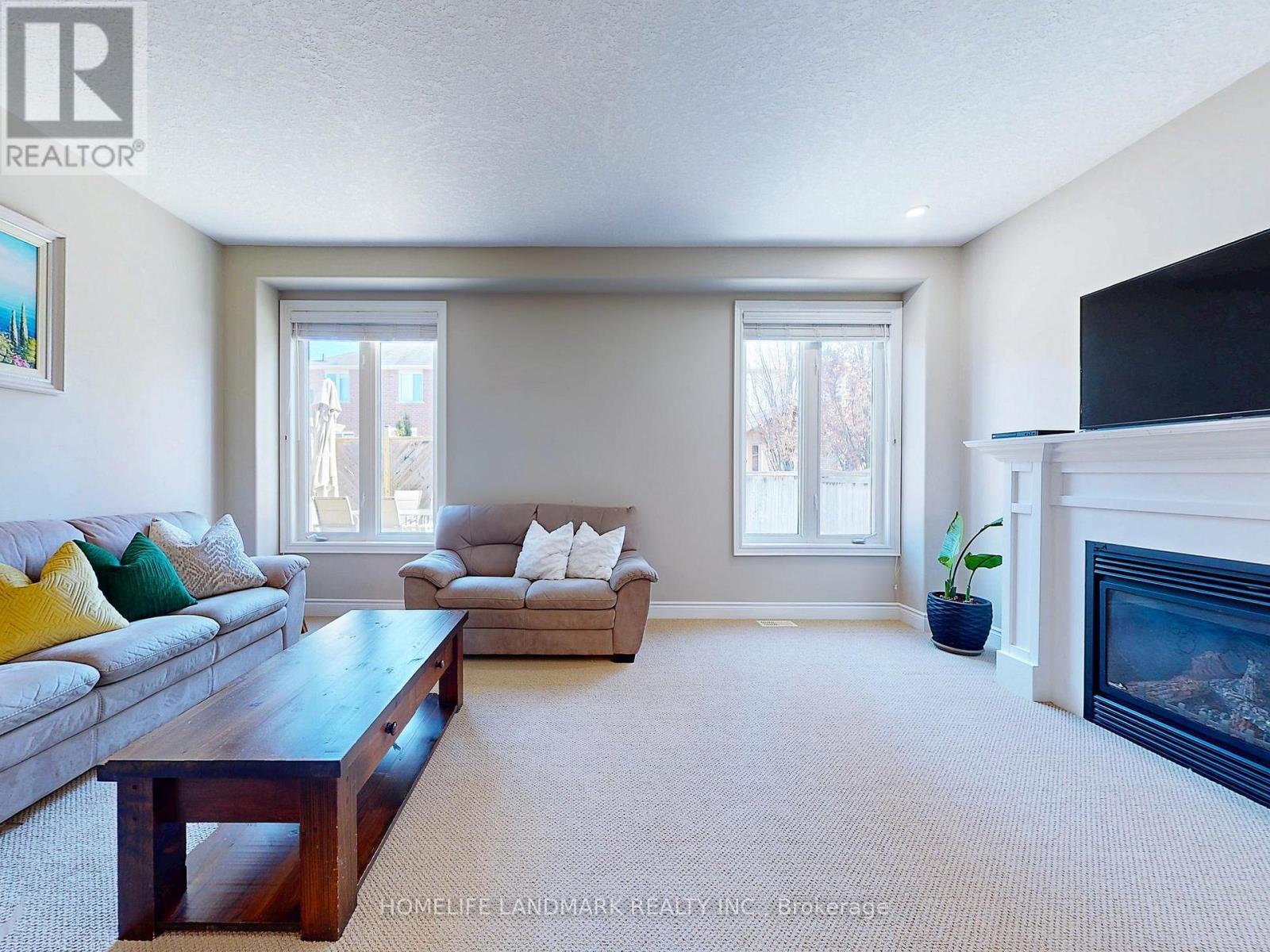 73 Graihawk Drive, Barrie, ON - Indoor Photo Showing Living Room With Fireplace