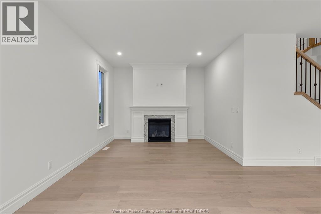 357 Marla Crescent, Lakeshore, ON - Indoor With Fireplace
