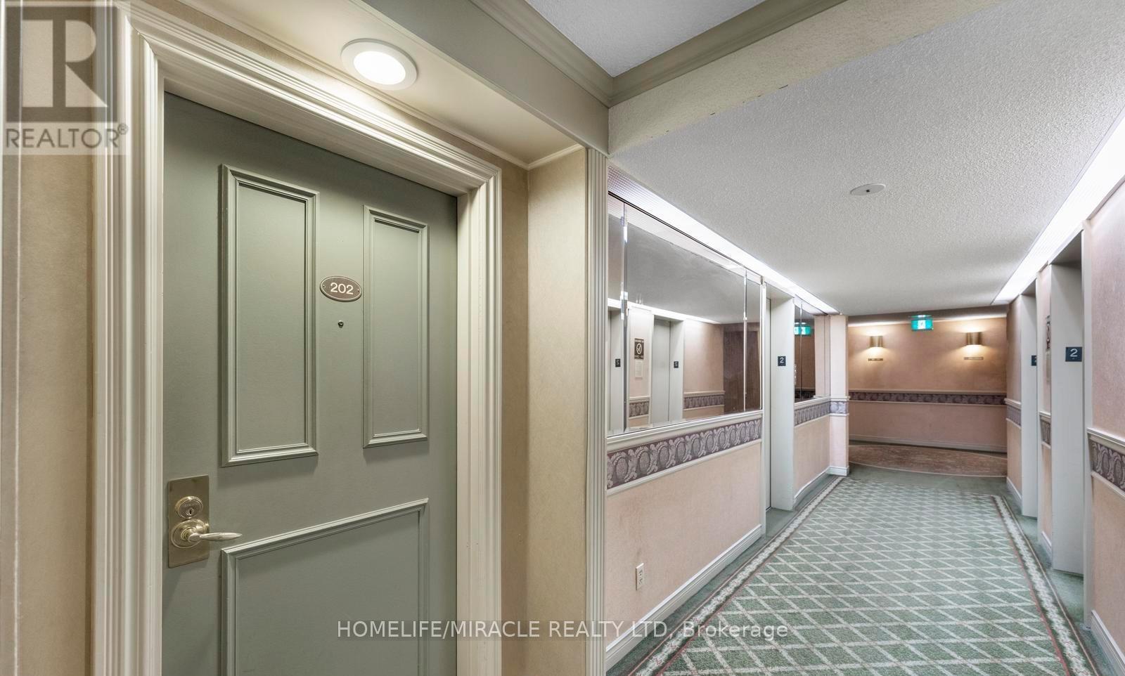 202 - 3700 Kaneff Crescent, Mississauga, ON - With Exterior