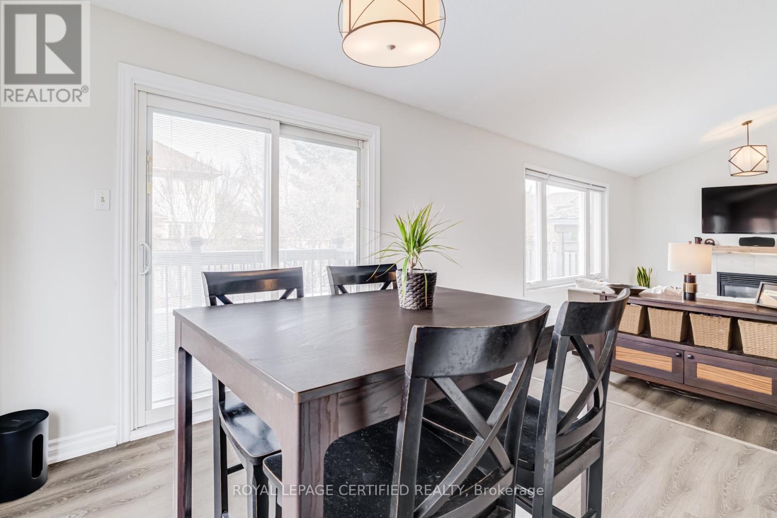 2197 Oakridge Crescent, Burlington, ON - Indoor Photo Showing Dining Room With Fireplace