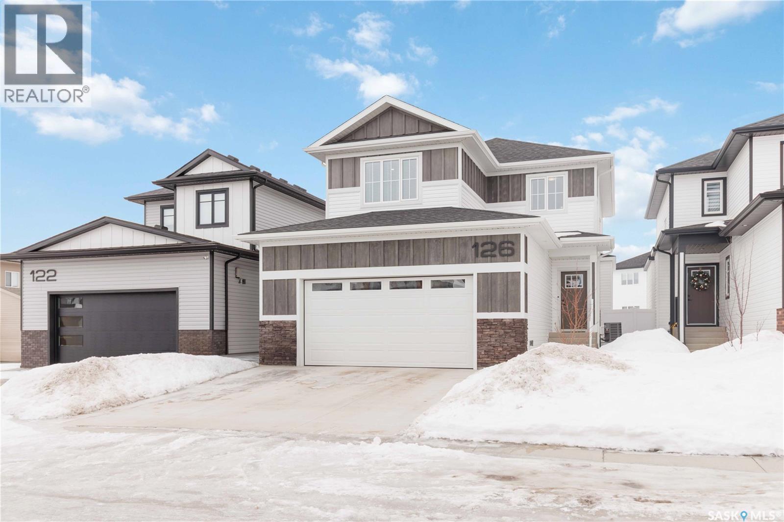 126 Chelsom Bend, Saskatoon, SK - Outdoor With Facade