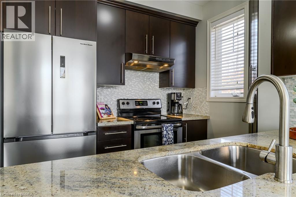 310 Fall Fair Way Unit# 34, Binbrook, ON - Indoor Photo Showing Kitchen With Double Sink With Upgraded Kitchen