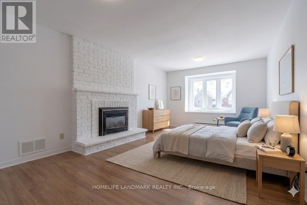 2453 Strathmore Crescent, Mississauga, ON - Indoor Photo Showing Bedroom With Fireplace