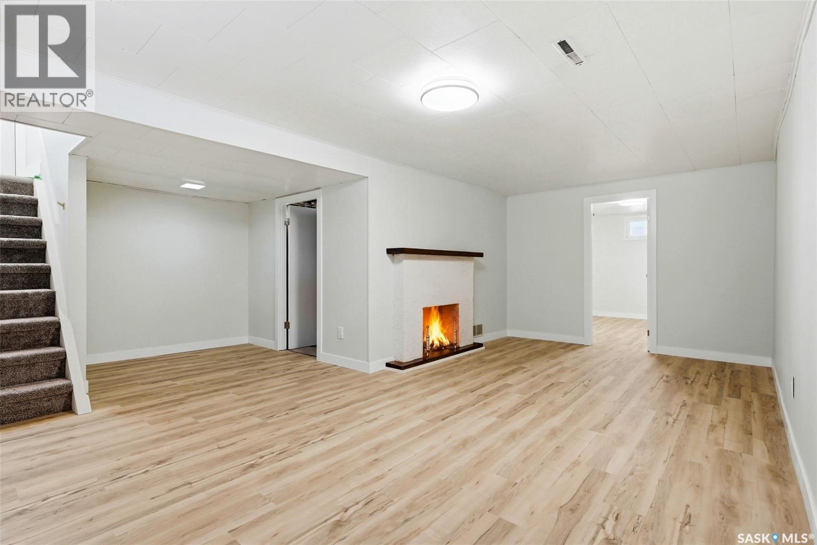 47 Mathieu Crescent, Regina, SK - Indoor With Fireplace